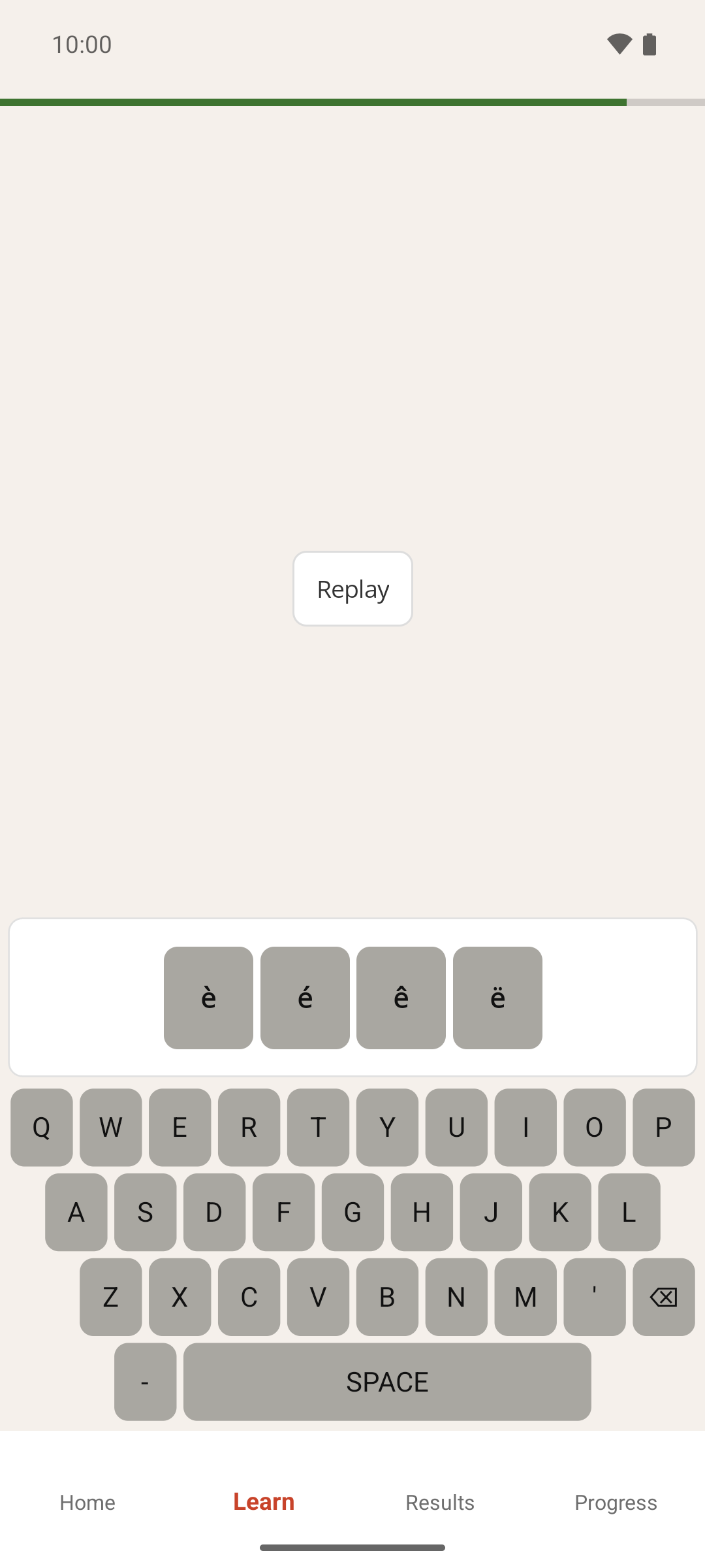The accent picker open above the keyboard after pressing and holding the E key, offering è, é, ê and ë