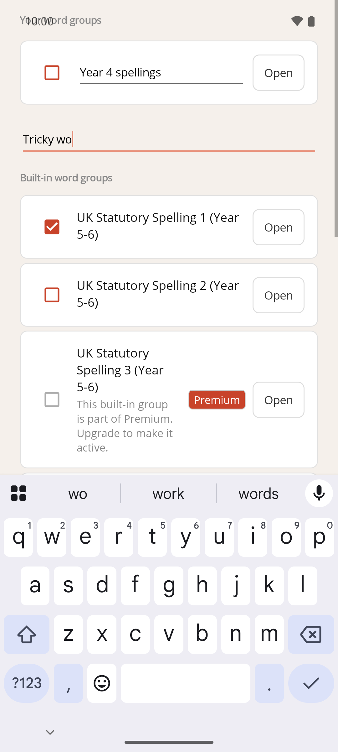 The Define Words screen with a new group name being typed into the Add a group field and the device keyboard open